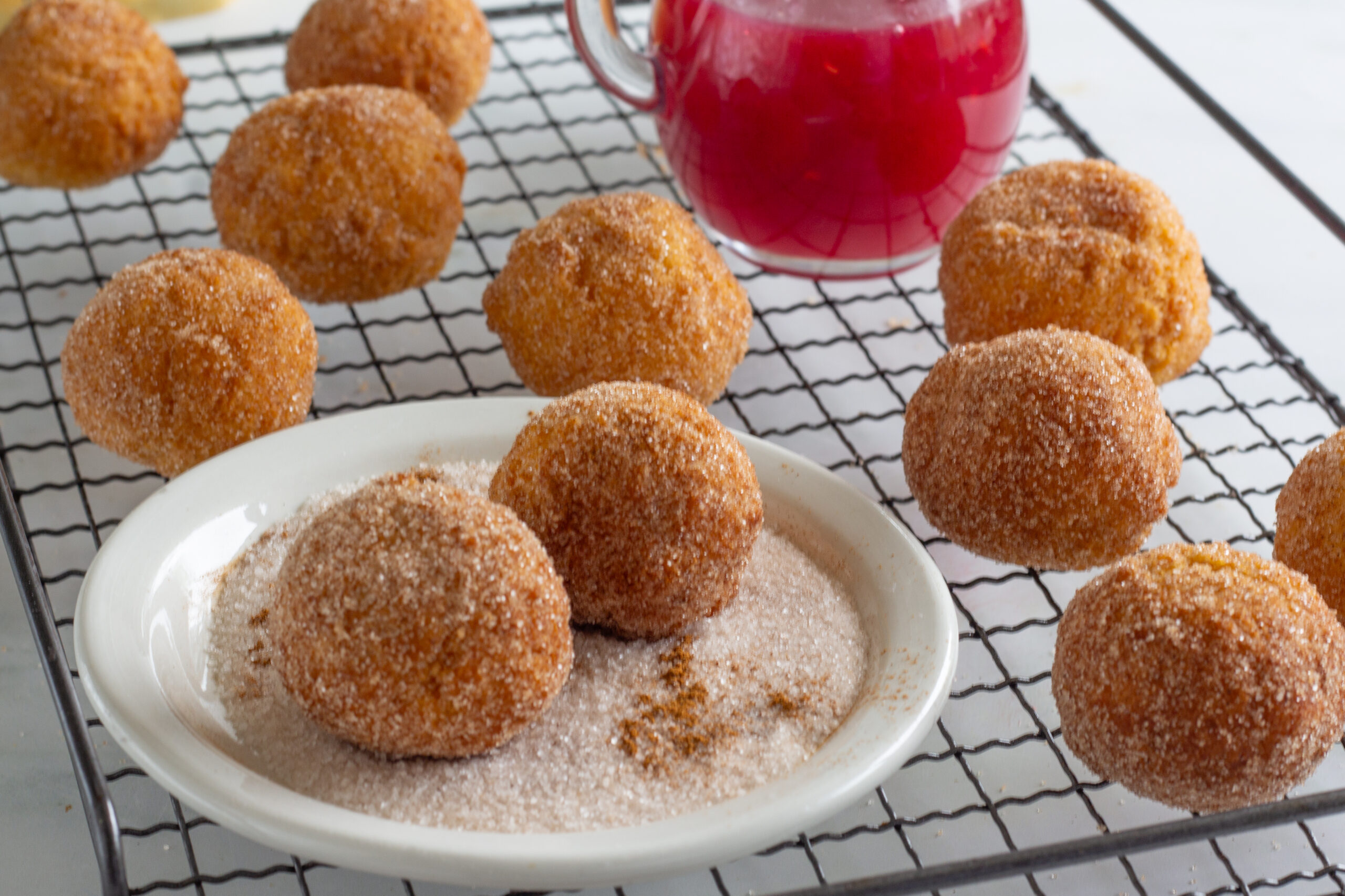 Mini Cinnamon Doughnuts with Raspberry Sauce